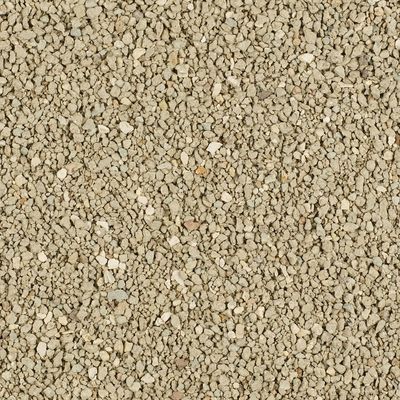 Close-up of beige, granular material, possibly cat litter or similar substrate.