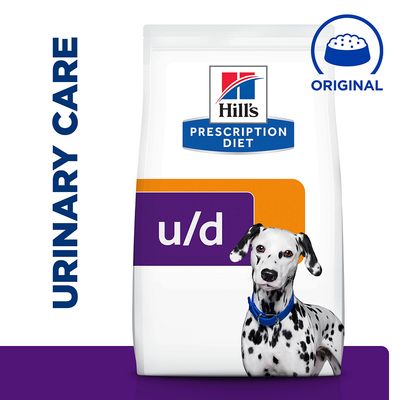 Hill's Prescription Diet u/d kutyatáp csomagolás, dalmata kutya képe, URINARY CARE felirat, ORIGINAL tálka ikon látható.
