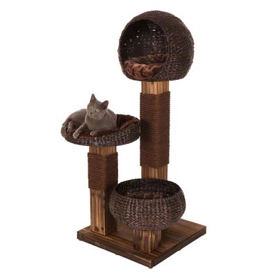 Cat tree made of wood and woven material with three levels: cave, lying surface and basket. Cat on the middle level.
