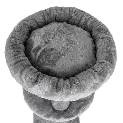 Grey, round cat bed with soft plush cover and floral patterns. Ideal for comfort and rest.