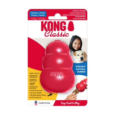 Juguete de goma roja KONG con inscripción 'KONG' visible. Esquina superior derecha con texto: Top ventas.