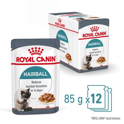 Royal Canin Hairball macskaeledel, 85 g x 12 tasak. Csomagoláson: Reduces hairball formation in 14 days*. Kép macskáról és eledelről. *ROYAL CANIN belső felmérés.