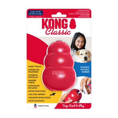 Juguete de goma roja KONG con inscripción 'KONG' visible. Esquina superior derecha con texto: Top ventas.