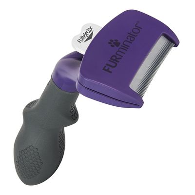 FURminator alat za njegu dlake s ergonomskom drškom i oštricom od nehrđajućeg čelika, vidljiv FURjector gumb za jednostavno čišćenje.