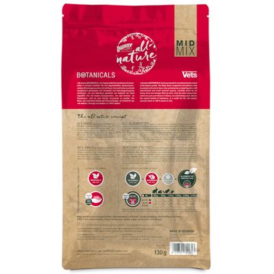 bunny all nature Botanicals MID MIX, 130 g-os csomag hátoldala, etetési útmutató táblázattal és összetevőkkel, angol és német nyelvű leírásokkal