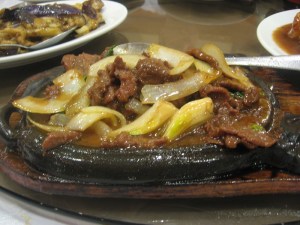 sizzling-beef-with-satay-sauce-eggplant-in-background Sizzling beef with satay sauce