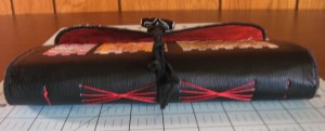 long stitch binding on book of muses Modified long stitch binding