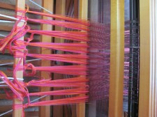 warp tied to front of floor loom