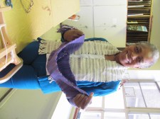 Irene with two handwoven scarves