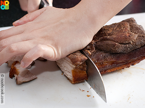 Making crispy roast pork (siu yuk)