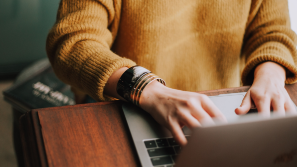 An individual using a laptop