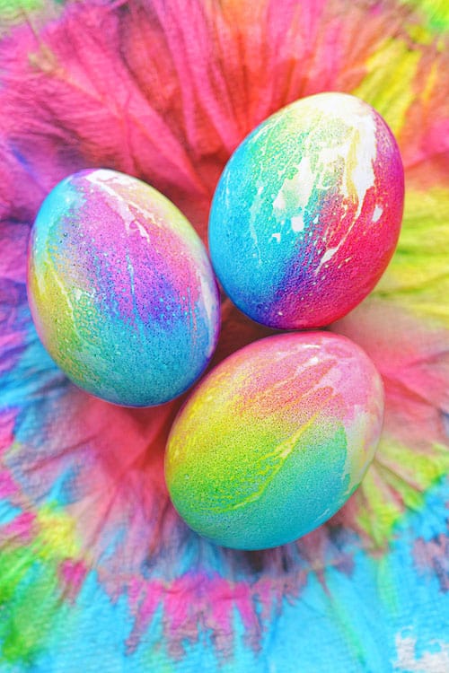 These tie dye Easter eggs are SO FUN and they're so simple to make! The colours are bright and beautiful and the eggs are completely safe to eat!