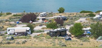 RVs and Campers at a lake
