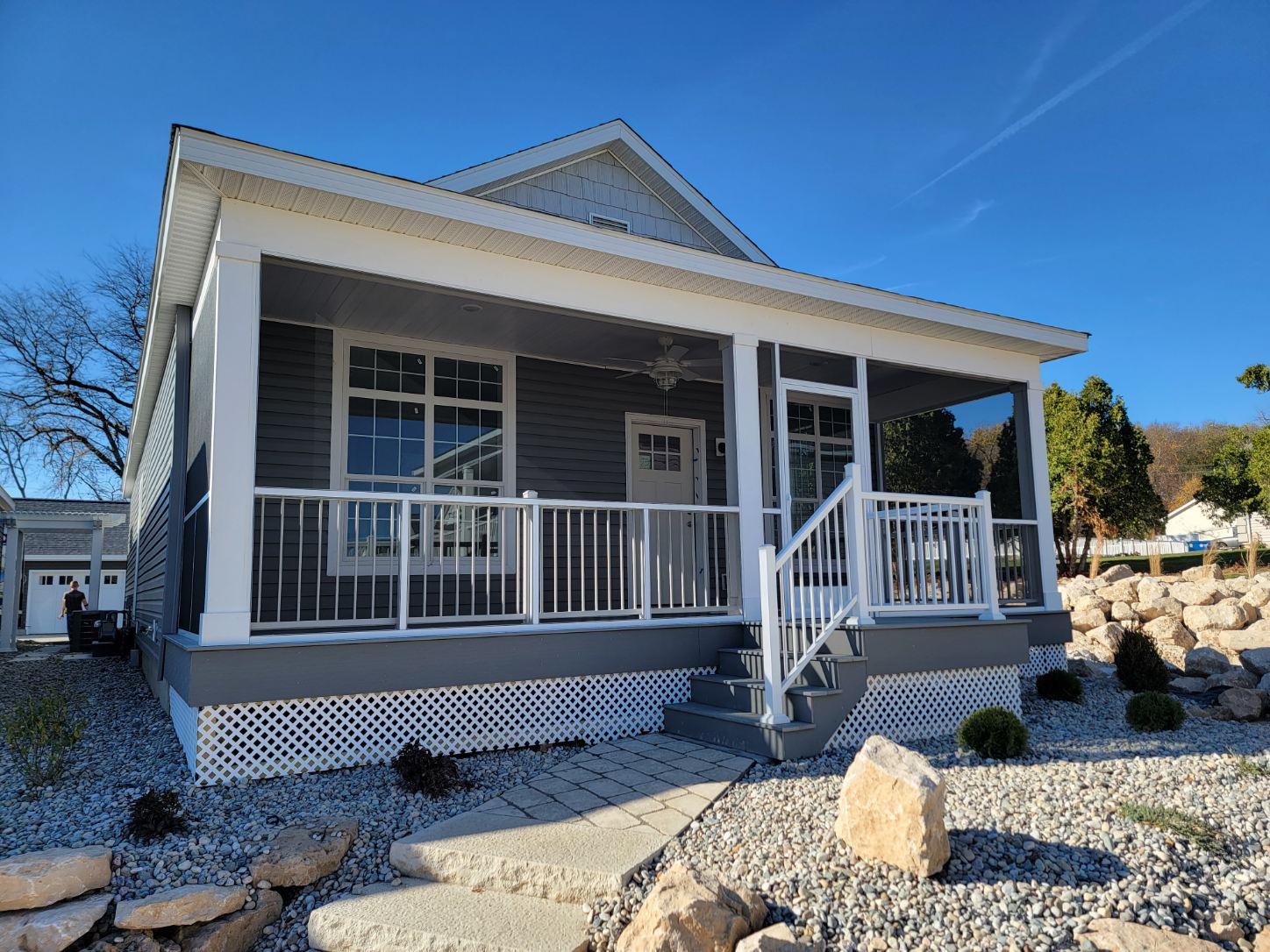 Waterview1 Screening Solutions Ohio installs fixed permanent porch screening onto a covered porch in Lakeside Marblehead, Ohio.