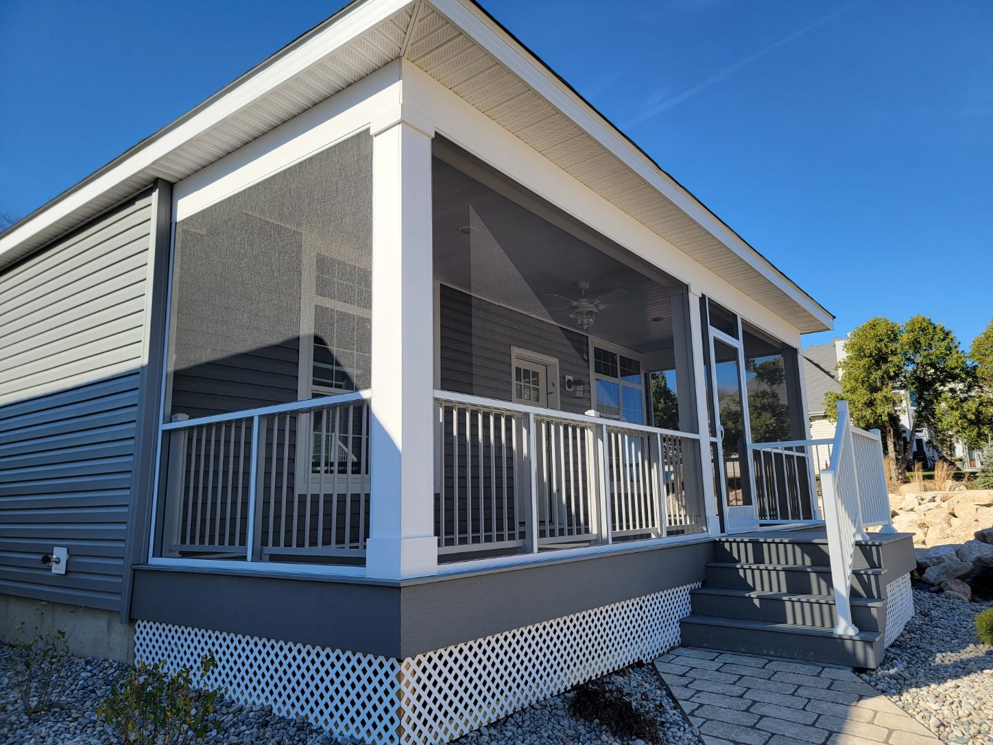 Waterview3 Screening Solutions Ohio installs fixed permanent porch screening onto a covered porch in Lakeside Marblehead, Ohio.