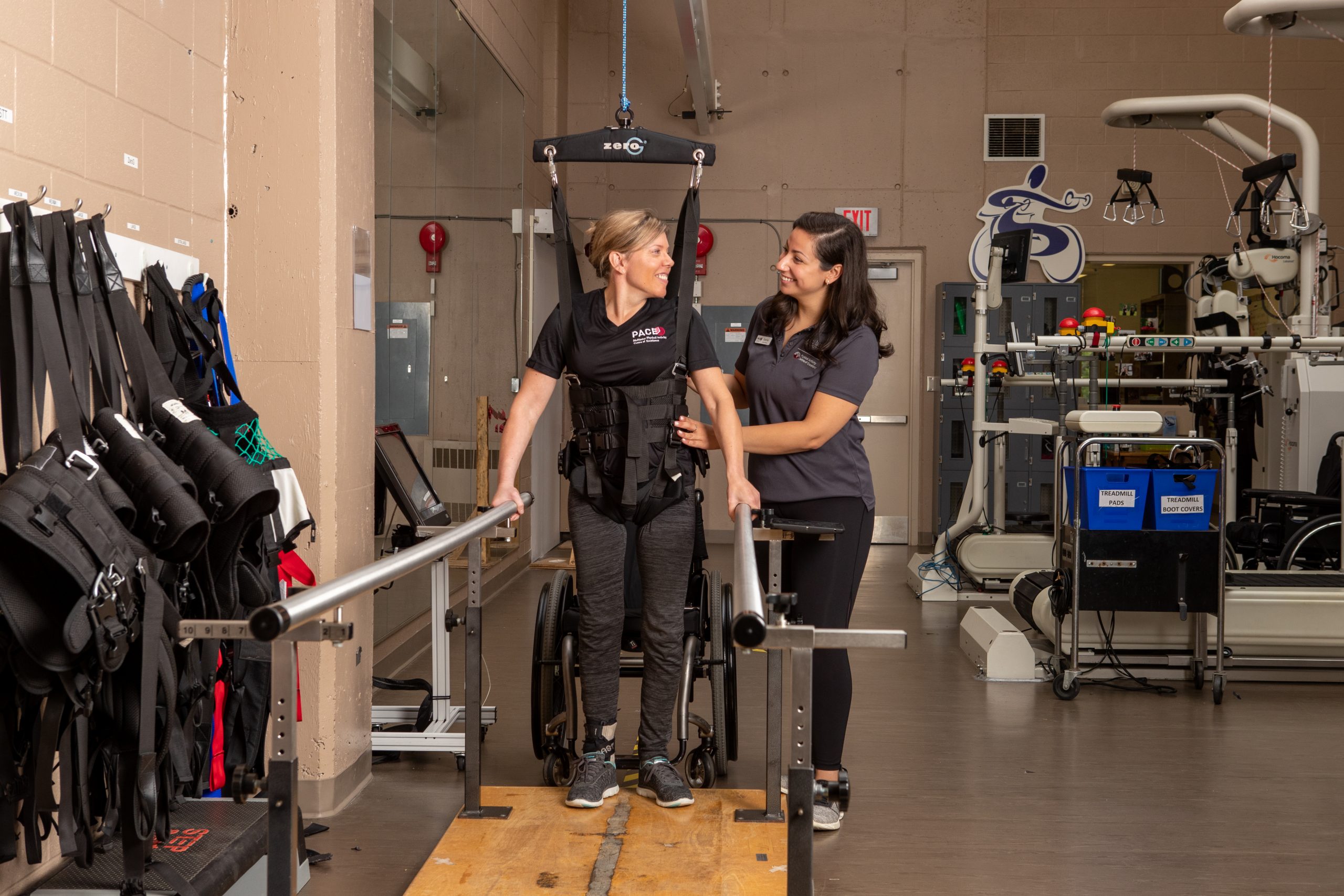 A client at the Master Physical Activity Centre of Excellence (PACE) with a volunteer.