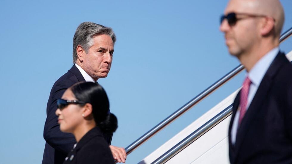 US Secretary of State Antony Blinken boards a plane as he departs Joint Base Andrews, Maryland, on October 21, 2024.