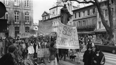 Women's rights groups rally outside the courthouse in Aix-en-Provence in southern France on 2 May 1978, at the opening of a landmark trial that would change the way French courts prosecute rape.