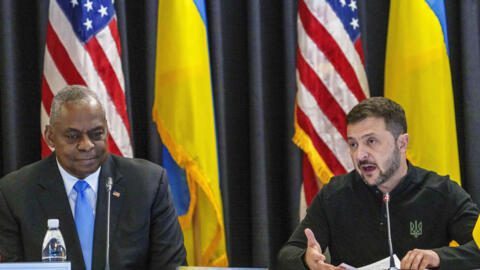 U.S. Defense Secretary Lloyd Austin, left, listens to Ukraine's President Volodymyr Zelenskyy during a meeting also with German's Defense Minister Boris Pistorius and Chairman of the Joint Chiefs of S