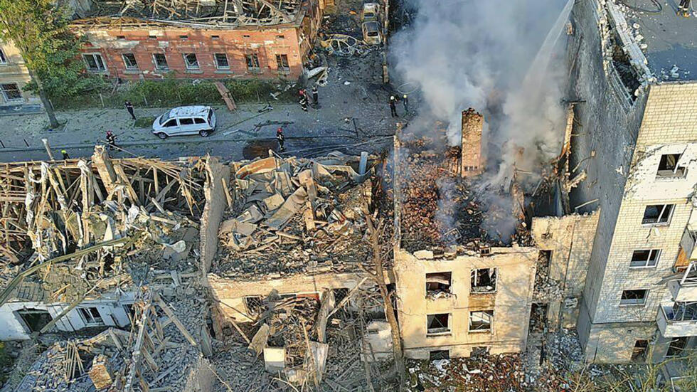 In this photo provided by the State Emergency Service of Ukraine, smoke rises from a building which was destroyed by a Russian strike in Lviv, Ukraine, Wednesday, Sept. 4, 2024