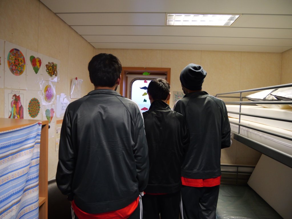 Three young men from Pakistan on board the Geo Barents share their stories of extortion and abuse as they journeyed through Libya and across the Central Mediterranean | February 2024 | Photo: Sou-Jie van Brunnersum
