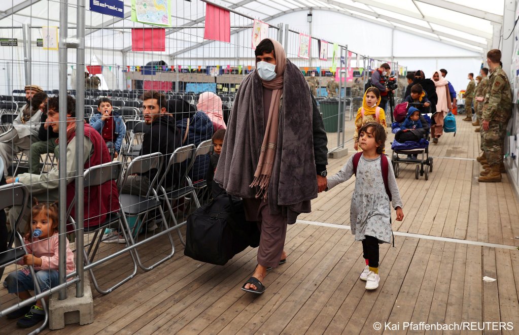 File photo: Evacuees from Afghanistan seen arriving at the US airbase in Ramstein, Germany on October 9, 2021 | Photo: Kai Pfaffenbach / Reuters