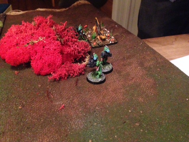 Izwahrians and their "sniffer lizard" ready themselves to charge Warzi and his goons
