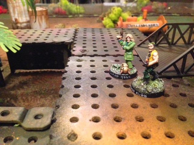 Conrad Moon and Kenman High starting to run away just after having received the figurine.