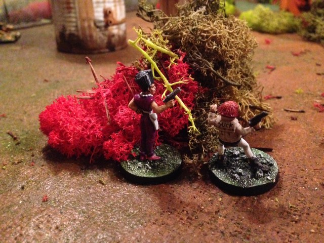 Catherine Wheel and Julee Jinx - members of a brat gang hired by Warzi - watch the izwahrians approach.