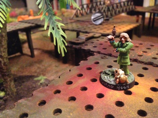Conrad Moon running for his life with the stolen figurine