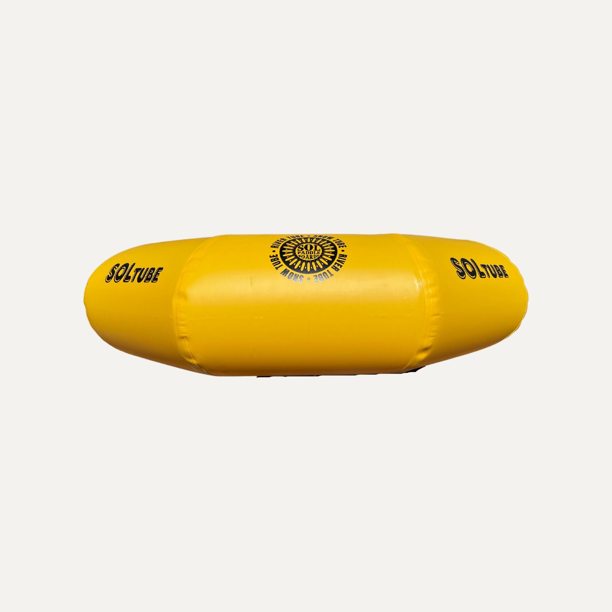 Single SOLtube inflatable in yellow and blue, viewed from the side.