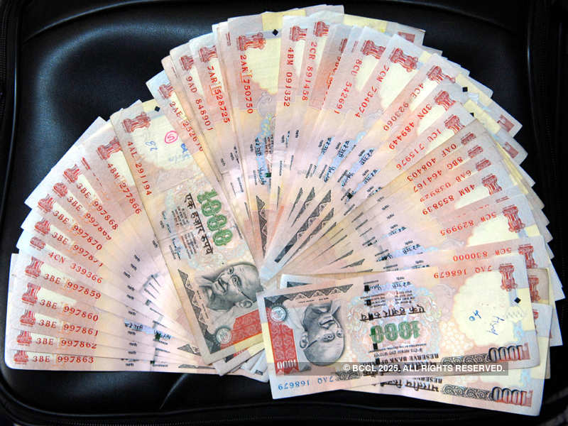 Rupee down on strong dollar demand