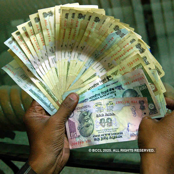 Rupee down on strong dollar demand