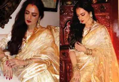 Rekha exudes grace in hand woven gold tissue stripe saree