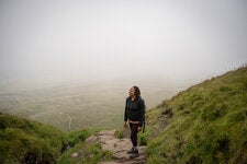 Rhiane Fatinikun, the founder of Black Girls Hike, on Ingleborough, a peak in the Yorkshire Dales National Park in England, after climbing it with a group of hikers this year.