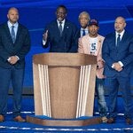 Kevin Richardson, Yusef Salaam, Korey Wise and Raymond Santana, who, with Antron McCray, are now known as the Exonerated Five, spoke at the Democratic National Convention in August. Al Sharpton is visible behind them.