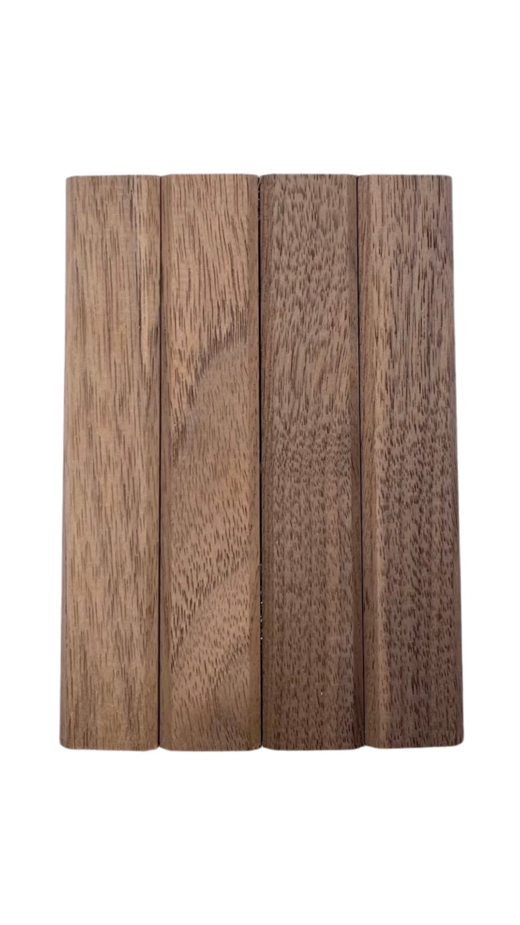 Wide plank architectural wood panels displayed vertically on a white background, highlighting their natural wood grain and premium finish. | Custom tambour and architectural wood specialists