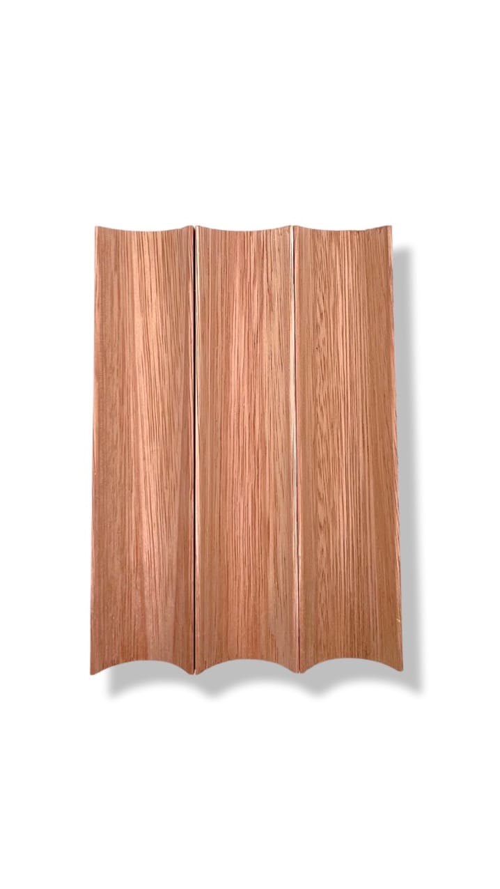 White oak tambour panels with natural grain, wavy bottoms, and soft shadow—ideal for modern interiors from Surfacing Solution. | Custom tambour and architectural wood specialists