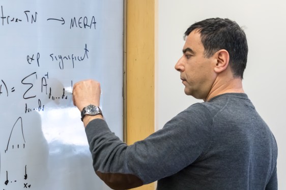 Professor Shashua writing on a whiteboard