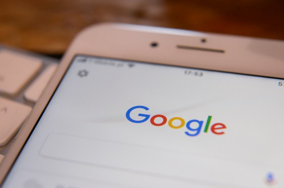 The Google search application is seen running on an iPhone