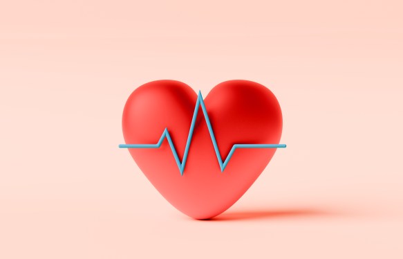 Conceptual image of a red heart with a line graph in front symbolizing Heart or ECG