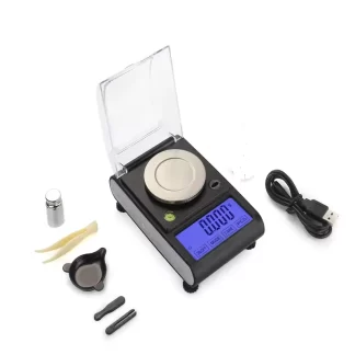 A black mini digital scale on a white background.