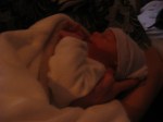 A side profile of Megan on her second day