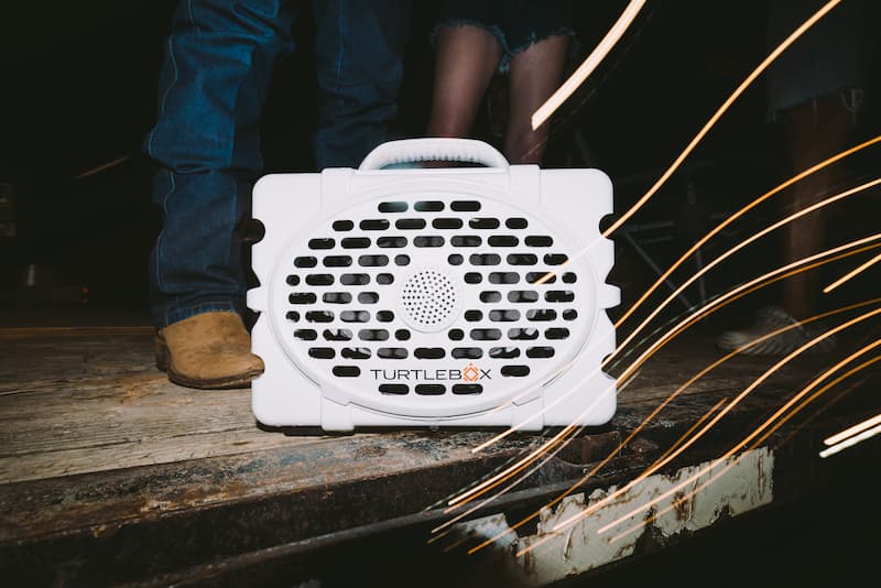 A Turtlebox Grande speaker in white playing music