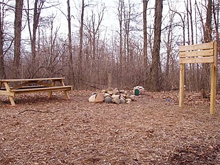 The cairn in the center marks the highpoint.