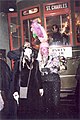 Phunny Phorty Phellows maskers in front of streetcar