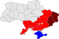 Mapa Ukrajiny vyznačující barevně oblasti jihovýchodu (světle červená), Doněckou a Luhanskou oblast (tmavě červená) a k Rusku se připojivší Krym (modrá)