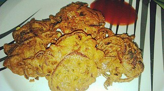 Onion fritters (Peyaji) are a Bengali dish made with onions