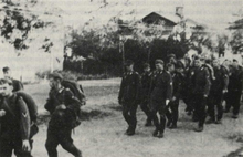 22. policejní prapor Daugava v Lucku v srpnu 1943 (lotyššský).