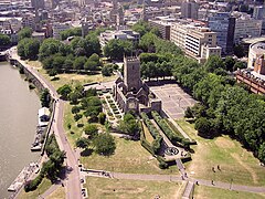 Western part of Castle Park, with ruined St Peter's Church in centre and Bristol Bridge just visible in top left. The old city lies beyond.